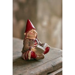 Ribenisse <br><br> Signe m/ julebog <br><br> B: 6,5 H: 9,7 L: 7 cm <br><br> 