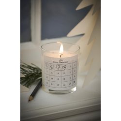 Kalenderlys <br><br> Glas med paraffinlys <br><br> etiket m/ 1-24 <br><br> ca. 35t  <br><br>