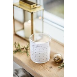 Kalenderlys <br><br> Glas med paraffinlys <br><br> etiket m/ 1-24 <br><br> ca. 35t  <br><br>